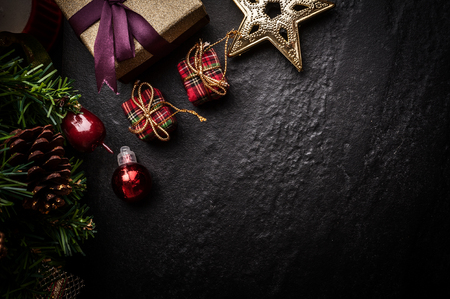 Christmas tree with decoration on dark stone backgroundの写真素材