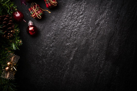 Christmas tree with decoration on dark stone backgroundの写真素材
