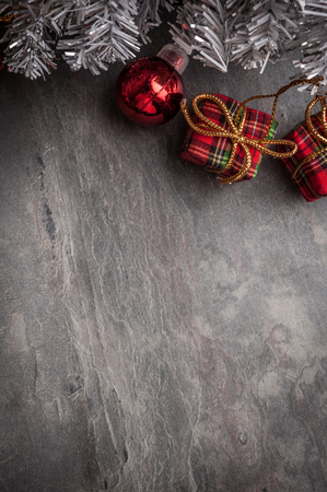 Christmas tree with decoration on dark stone backgroundの写真素材