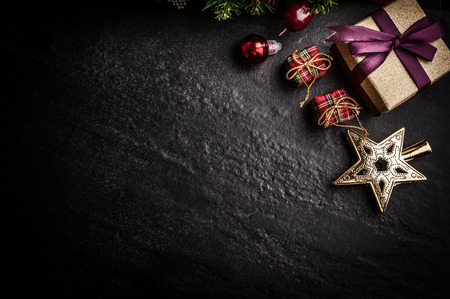 Christmas tree with decoration on dark stone backgroundの写真素材