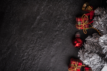 Christmas tree with decoration on dark stone backgroundの写真素材