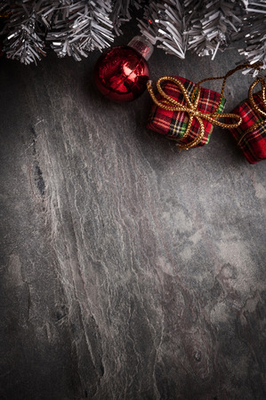 Christmas tree with decoration on dark stone backgroundの写真素材