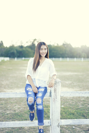 woman in a farm, breathe fresh air outdoors.Concept Refresh and beautyの写真素材