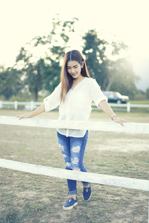 woman in a farm, breathe fresh air outdoors.Concept Refresh and beautyの写真素材