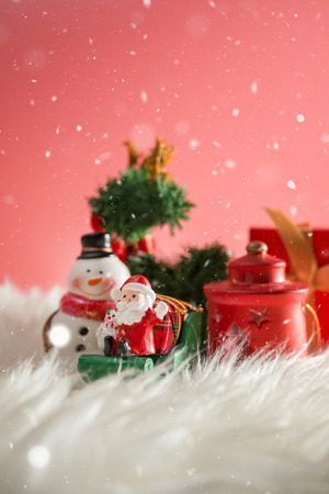 Christmas holiday background with Santa and decorations. Christmas landscape with gifts and snow. Merry christmas and happy new year greeting card with copy-space. Christmas celebration holiday background.の写真素材