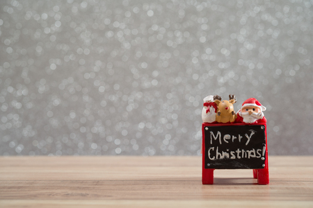 Christmas holiday background with Santa and decorations. Christmas landscape with gifts and snow. Merry christmas and happy new year greeting card with copy-space. Christmas celebration holiday background.の写真素材