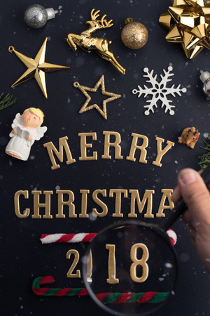 Christmas holiday background with gold ornaments and decorations. Merry christmas and happy new year greeting card with copy space. Christmas celebration holiday background.の写真素材