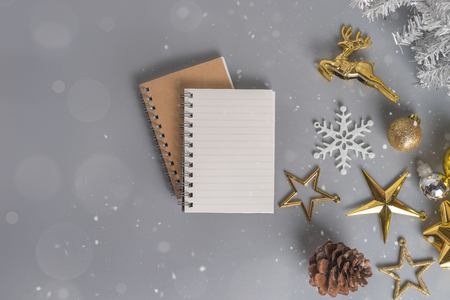 Christmas holiday background with gold ornaments and decorations. Merry christmas and happy new year greeting card with copy space. Christmas celebration holiday background.の写真素材