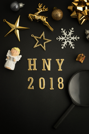 Happy new year 2018 holiday background with gold ornaments and decorations. Merry christmas and happy new year greeting card with copy space. New year celebration holiday background.の写真素材