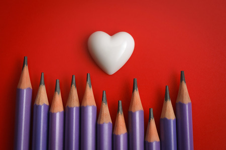 I LOVE YOU. Valentine's hearts on white envelope background with copy space. Symbol of love. Happy Valentines Day background concept.の写真素材