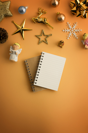 Christmas holiday background with gold ornaments and decorations. Merry christmas and happy new year greeting card with copy space. Christmas celebration holiday background.の写真素材