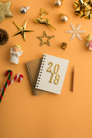Christmas holiday background with gold ornaments and decorations. Merry christmas and happy new year greeting card with copy space. Christmas celebration holiday background.の写真素材