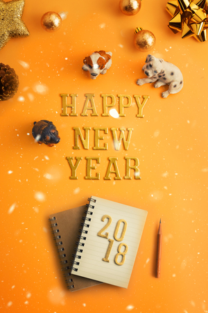 Happy new year 2018 holiday background with gold ornaments and decorations. Merry christmas and happy new year greeting card with copy space. New year celebration holiday background.の写真素材