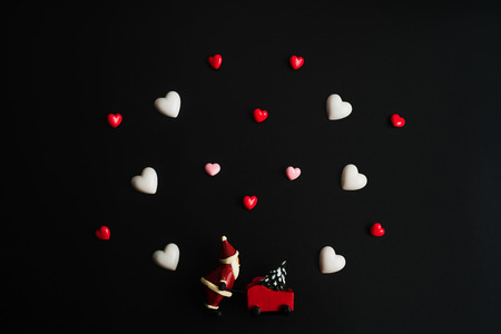 Santa working for love. Happy Valentines Day background concept. Can be used for celebrations valentines day.の写真素材