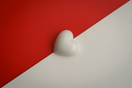 Valentines heart on a red and white background.Happy Valentines Day background. Can be used for celebrations valentines day.の写真素材