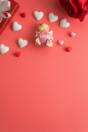 Flat view of valentines hearts and decoration on pink background with copy space. Symbol of love. Happy Valentines Day background.Saint Valentine's Day concept.の写真素材