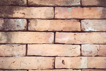 Old red brick wall textures and backgrounds. Can be use as background texture or wallpaper.の写真素材