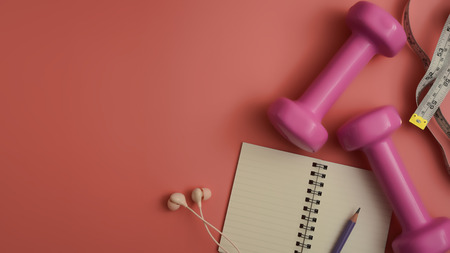 Styled stock photography of fitness equipment dumbbells notepad pencil and earphone on pink background. Flat lay.の写真素材