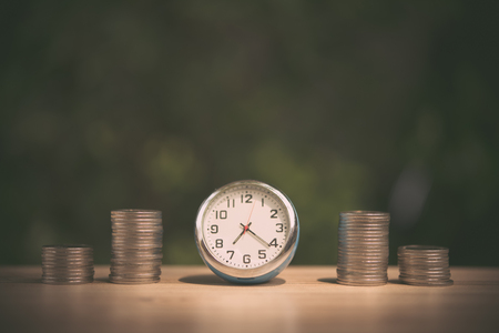 Saving to buy a house or home savings concept with money coin stack growing.Saving money concept.の写真素材