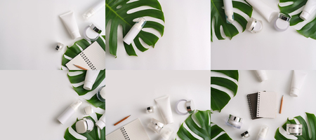Set 6 of white cosmetic products and green leaves on white background. Natural beauty products for branding mock-up concept.Top view with copy space. Flat layの写真素材