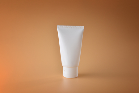 Set of cosmetic products on a color background. Cosmetic package collection for cream, soups, foams, shampoo.Natural beauty blank label for branding mock-up concept.の写真素材
