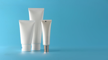 Set of cosmetic products on a color background. Cosmetic package collection for cream, soups, foams, shampoo.Natural beauty blank label for branding mock-up concept.の写真素材