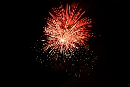 Colorful fireworks on the black sky backgroundの写真素材