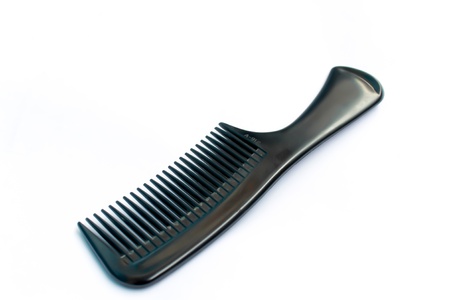 Black comb isolated on white close up lookの写真素材