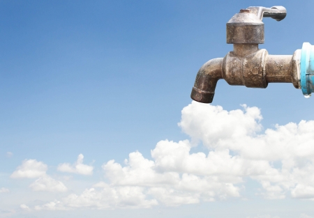 The faucet against the blue sky ,Like a cloud Smoke の写真素材