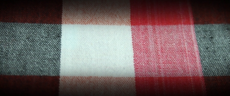 Colorful checkered loincloth fabric backgroundの写真素材