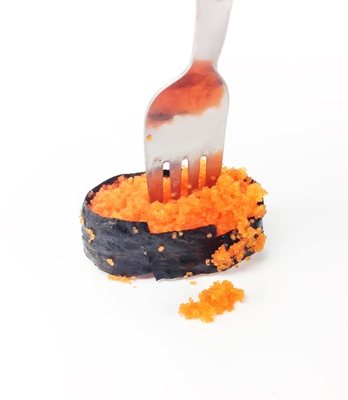 Fork on Sushi on white backgroundの写真素材