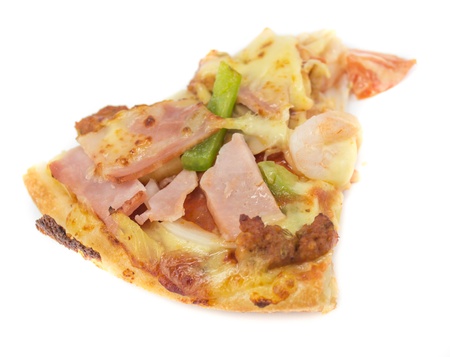 Slice of fresh pizza with ham isolated on whiteの写真素材