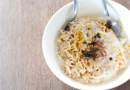 instant noodles on wooden table の写真素材