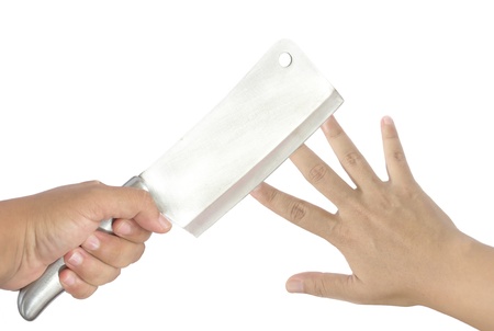 knife cutting finger of hand isolated on white  