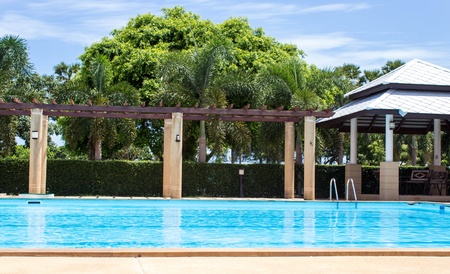 Swimming pool and lush vegetationのeditorial素材