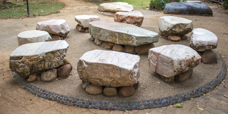 Big stone Garden Table and nine chairs の写真素材