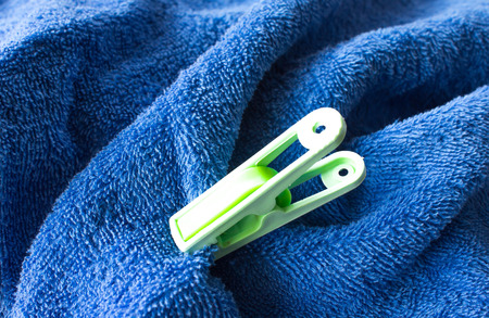 Blue   towels  with  clothes pegsの写真素材
