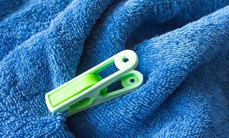 Blue   towels  with  clothes pegsの写真素材