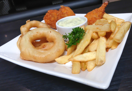 A plate of french fries with catchupの写真素材