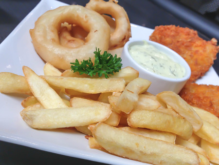 A plate of french fries with catchupの写真素材