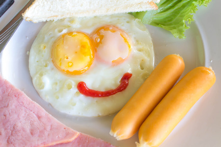 The nice breakfast with love with smile eggの写真素材