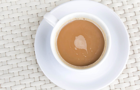 Hot coffee in cup on the tableの写真素材