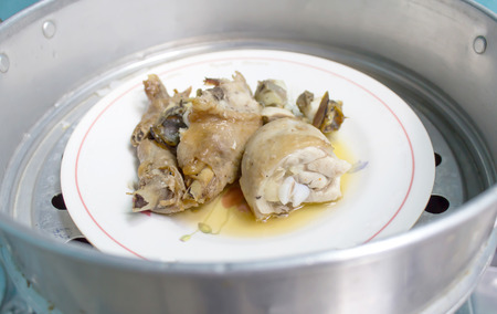 steaming chicken in a steamer inside  pots thai style with is a folkwaysの写真素材