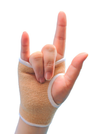 Trauma of wrist with brace on a white background. Fingers show  is loveの写真素材