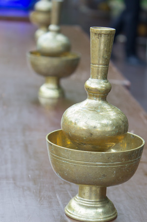 Pour water container for libation tool at Thailandの写真素材