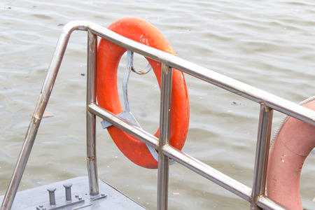 Life buoy attached to the cruise shipの写真素材