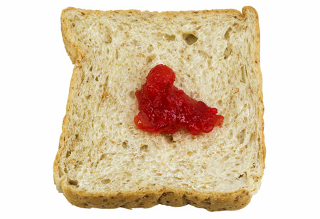 bread with strawberry jam on white backgroundの写真素材