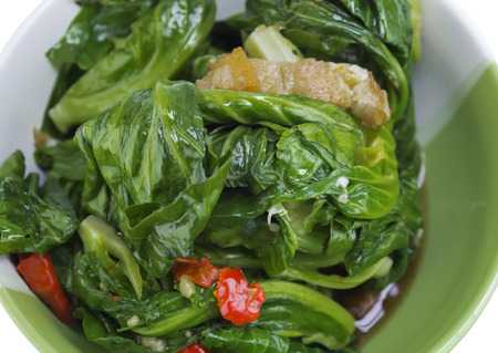 stir fried vegetables in the bowl on white backgroundの写真素材