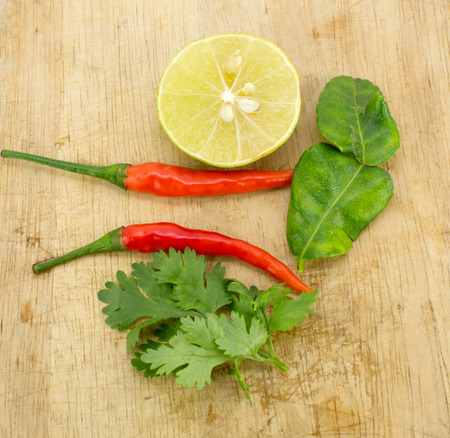 Tom Yum(Thai food) with seasoning ingredients on chopping blockの写真素材