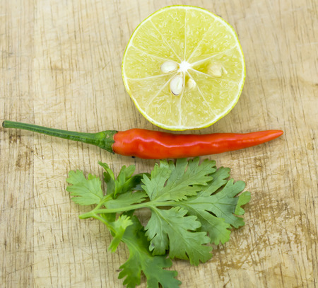 Tom Yum(Thai food) with seasoning ingredients on chopping blockの写真素材